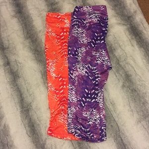 Two pairs of jockey sport capris